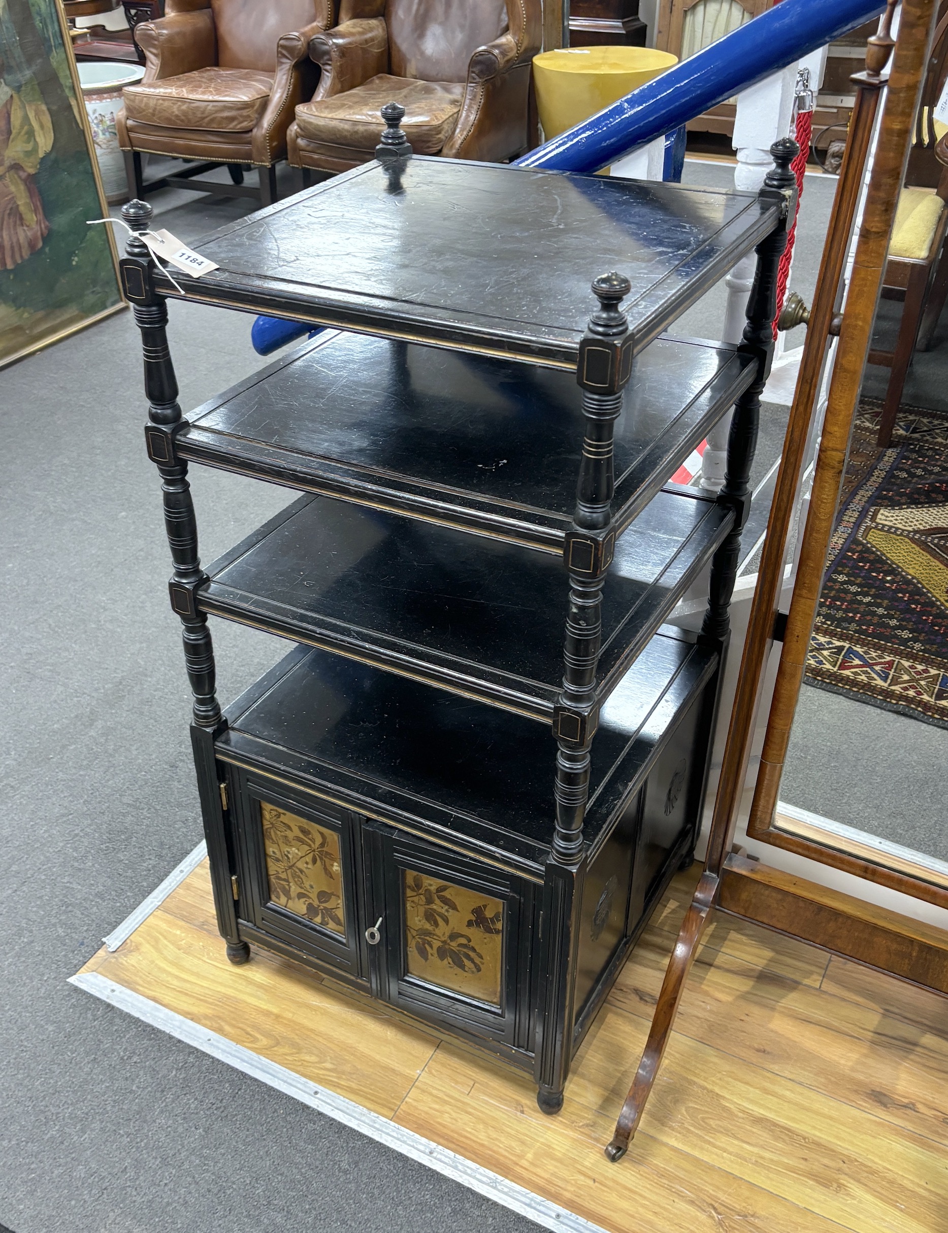 A Victorian Jas Shoolbred inlaid ebonised whatnot, width 50cm, depth 51cm, height 105cm